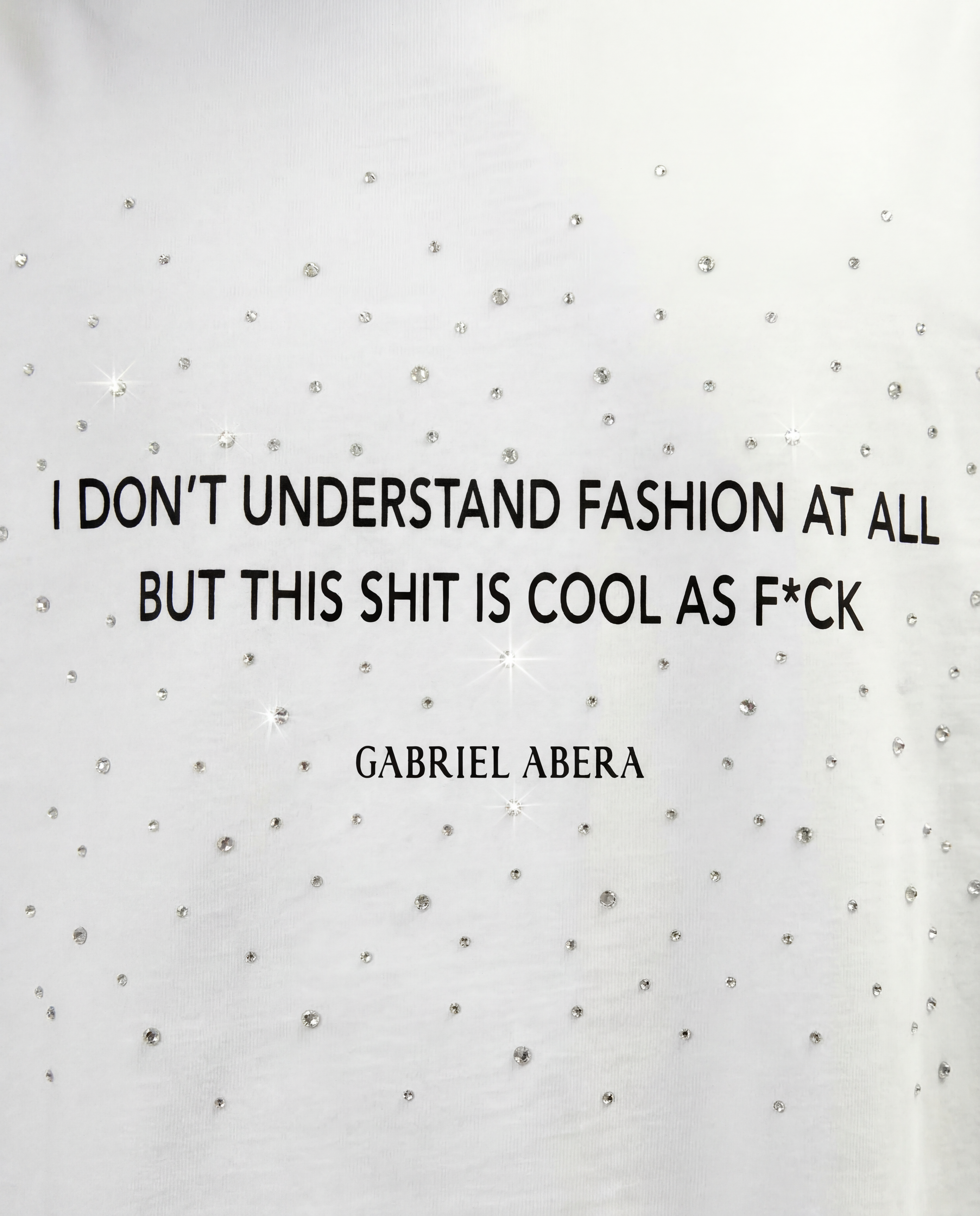 Detailed view of rhinestones on white cotton streetwear T-shirt by GABRIEL ABERA.