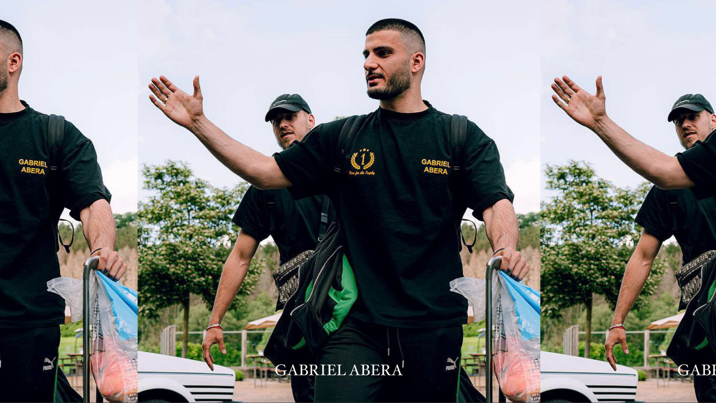 German national football player from VfB Stuttgart Deniz Undav dressed in black Gabriel Abera tshirt ar DFB arrival. It combines premium craftsmanship with a relaxed fit.