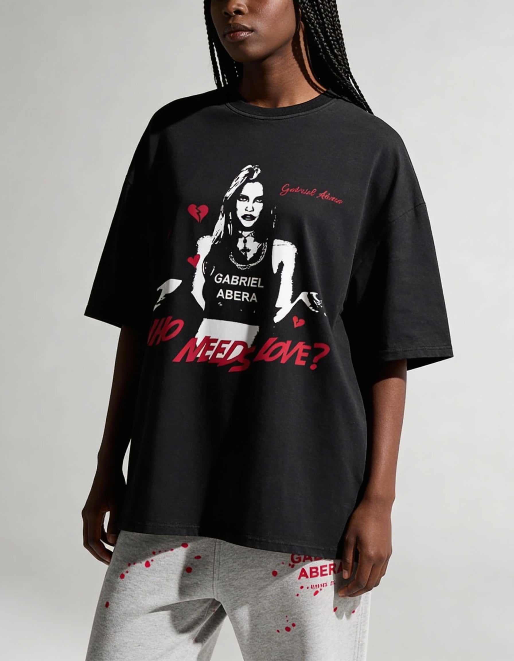 Side view of Black Rebel Heart T-Shirt by Gabriel Abera showcasing relaxed oversized fit and artistic streetwear vibe."