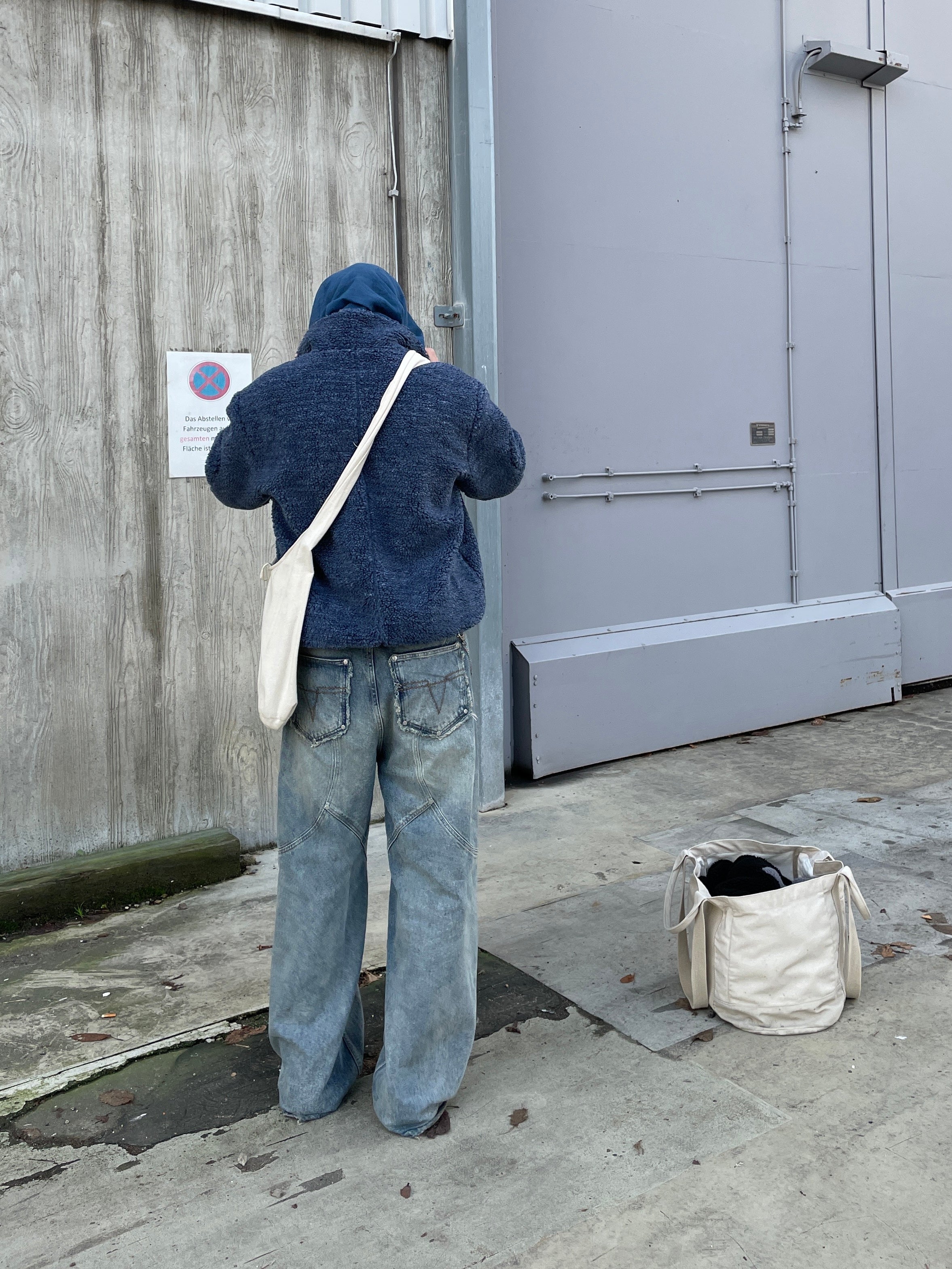 Male model wearing a Blue fleece jacket