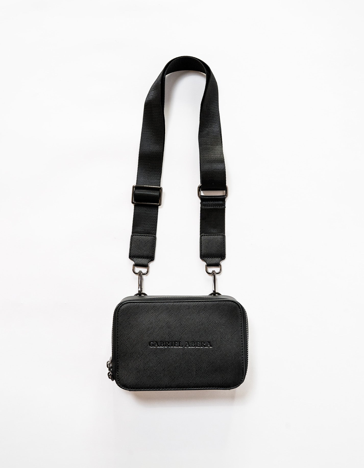 Front view of black Shoulder Bag with Gabriel Abera inprint