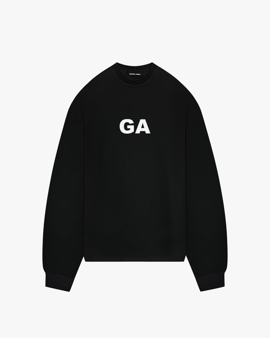 Black oversize long sleeve with Capital white letters GA in the front