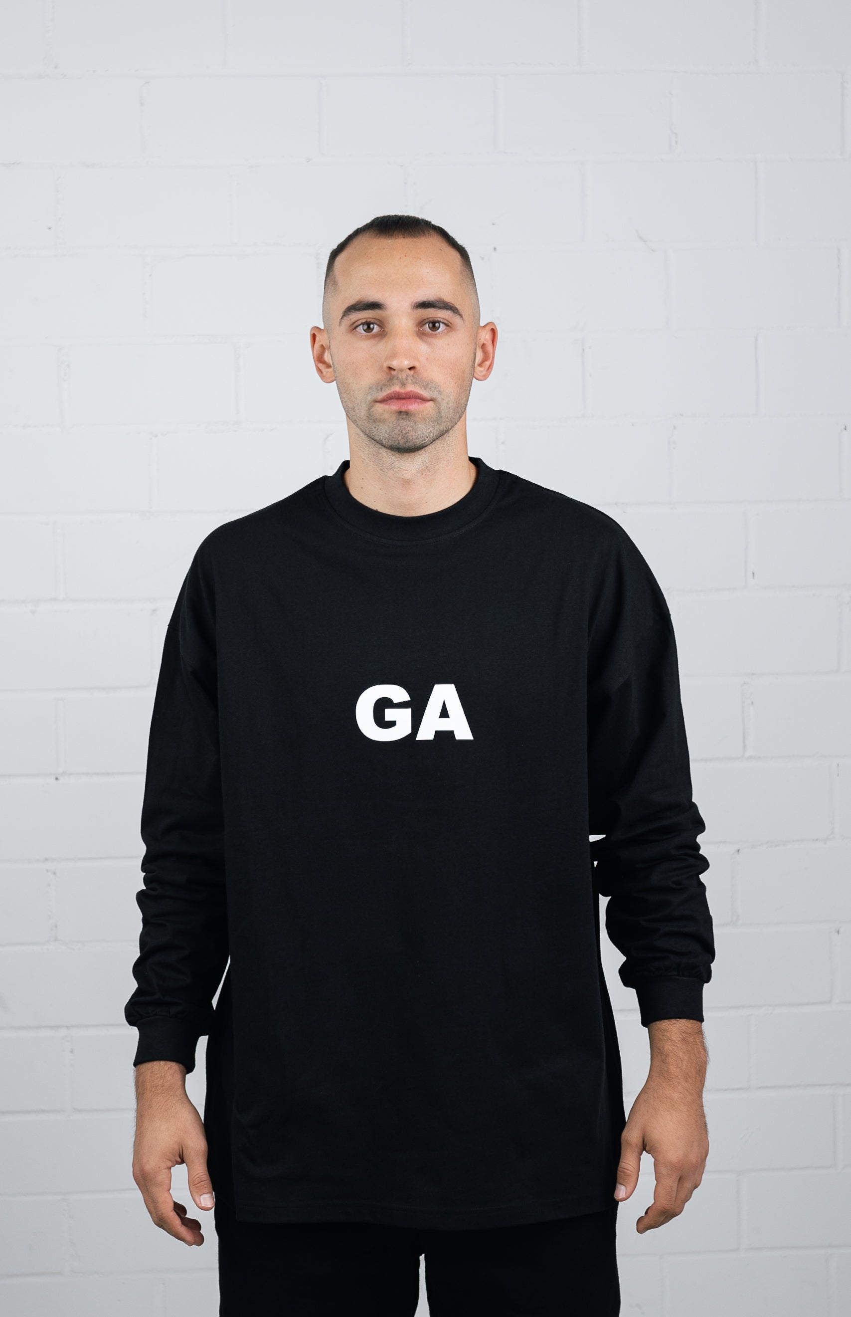 Front View Black Long sleeve worn by male model
