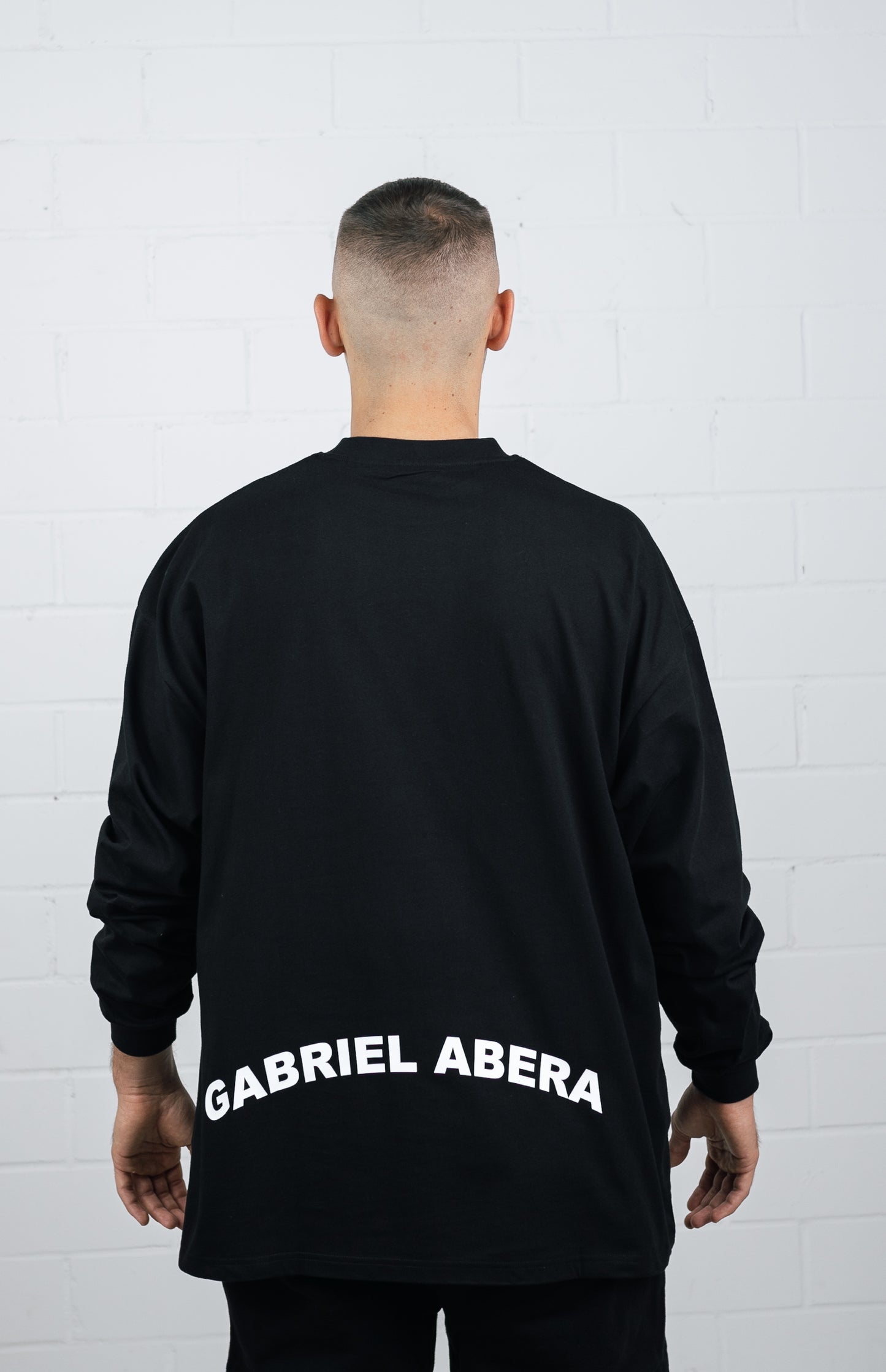 Back View Black Long sleeve worn by male model