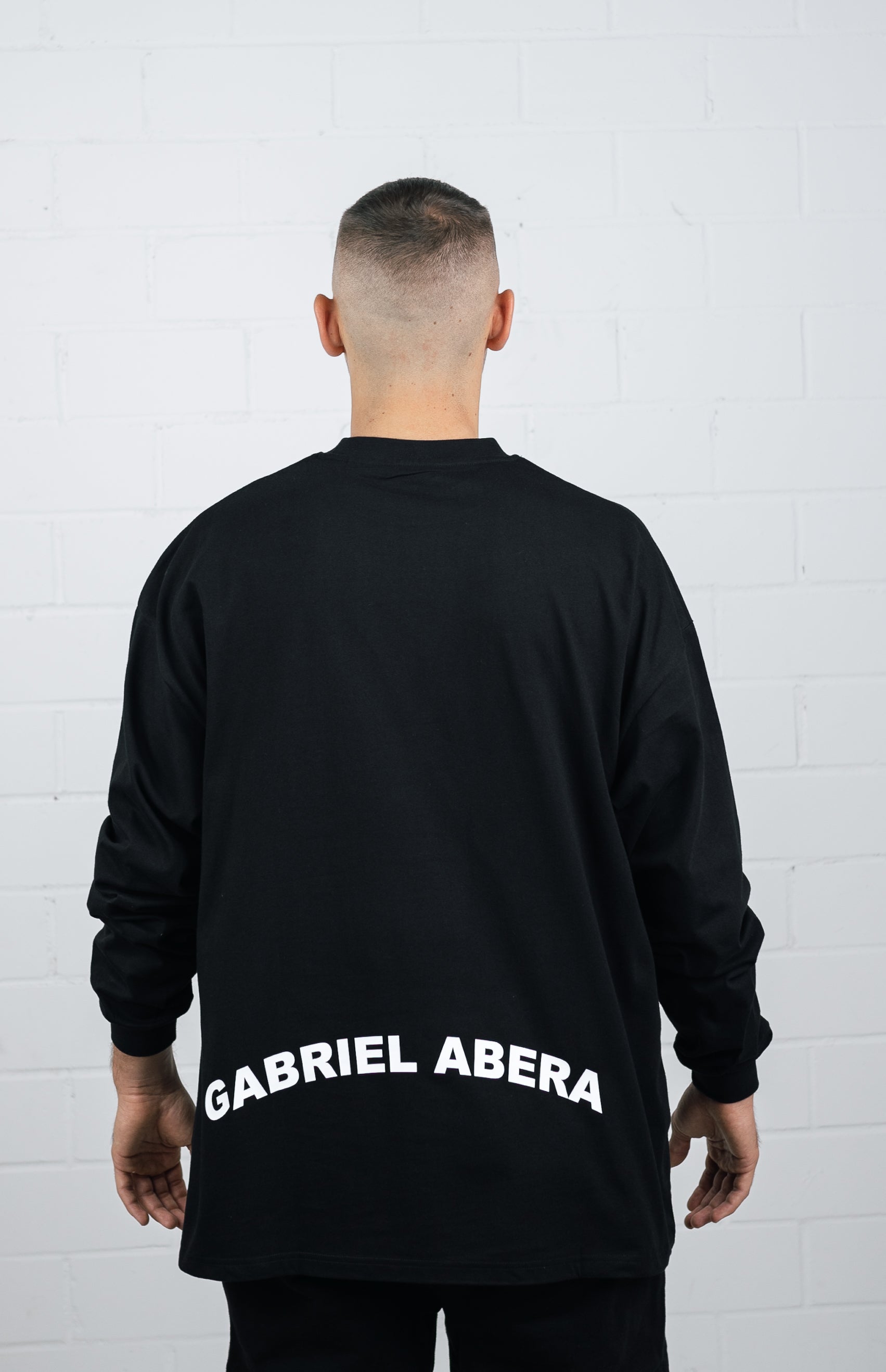 Back View Black Long sleeve worn by male model