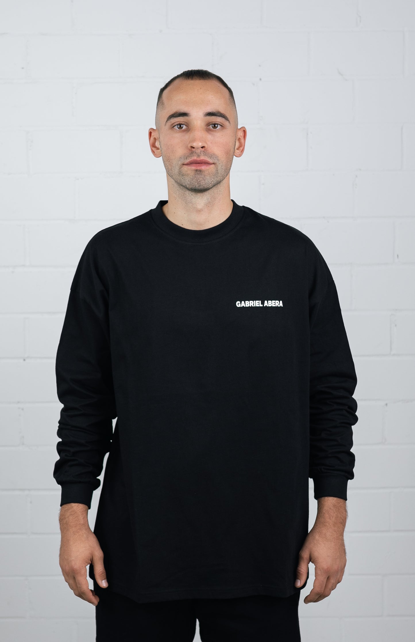Front View Black Long sleeve worn by male model