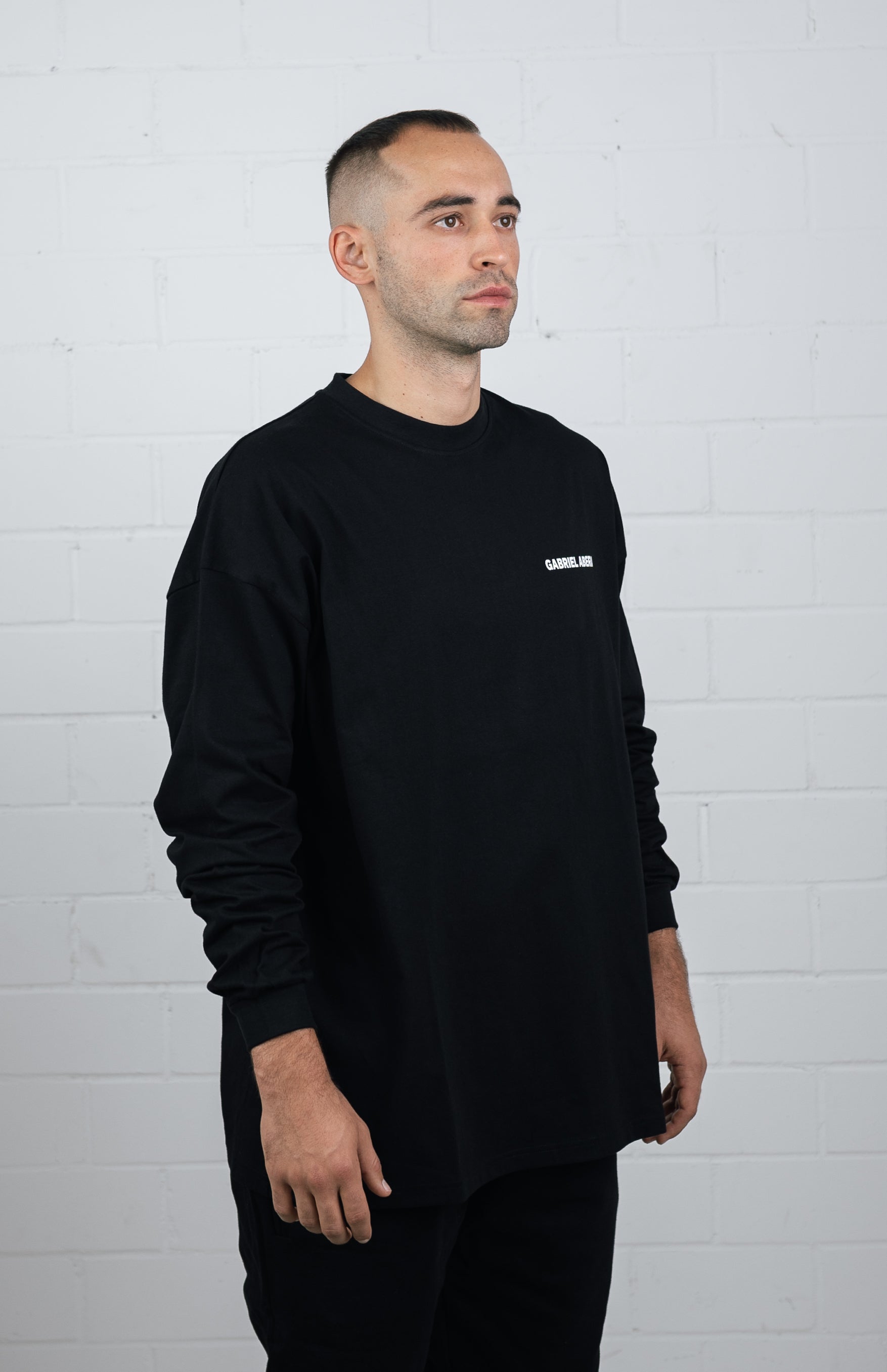 Side View Black Long sleeve worn by male model