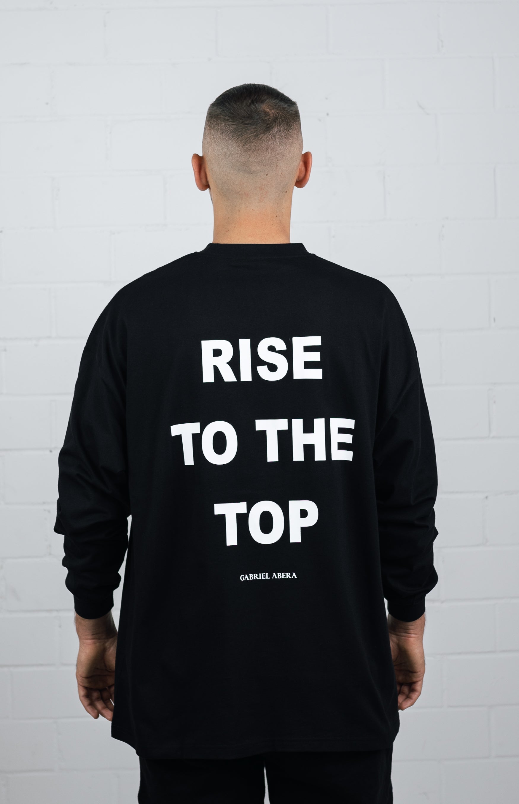 Back View Black Long sleeve worn by male model