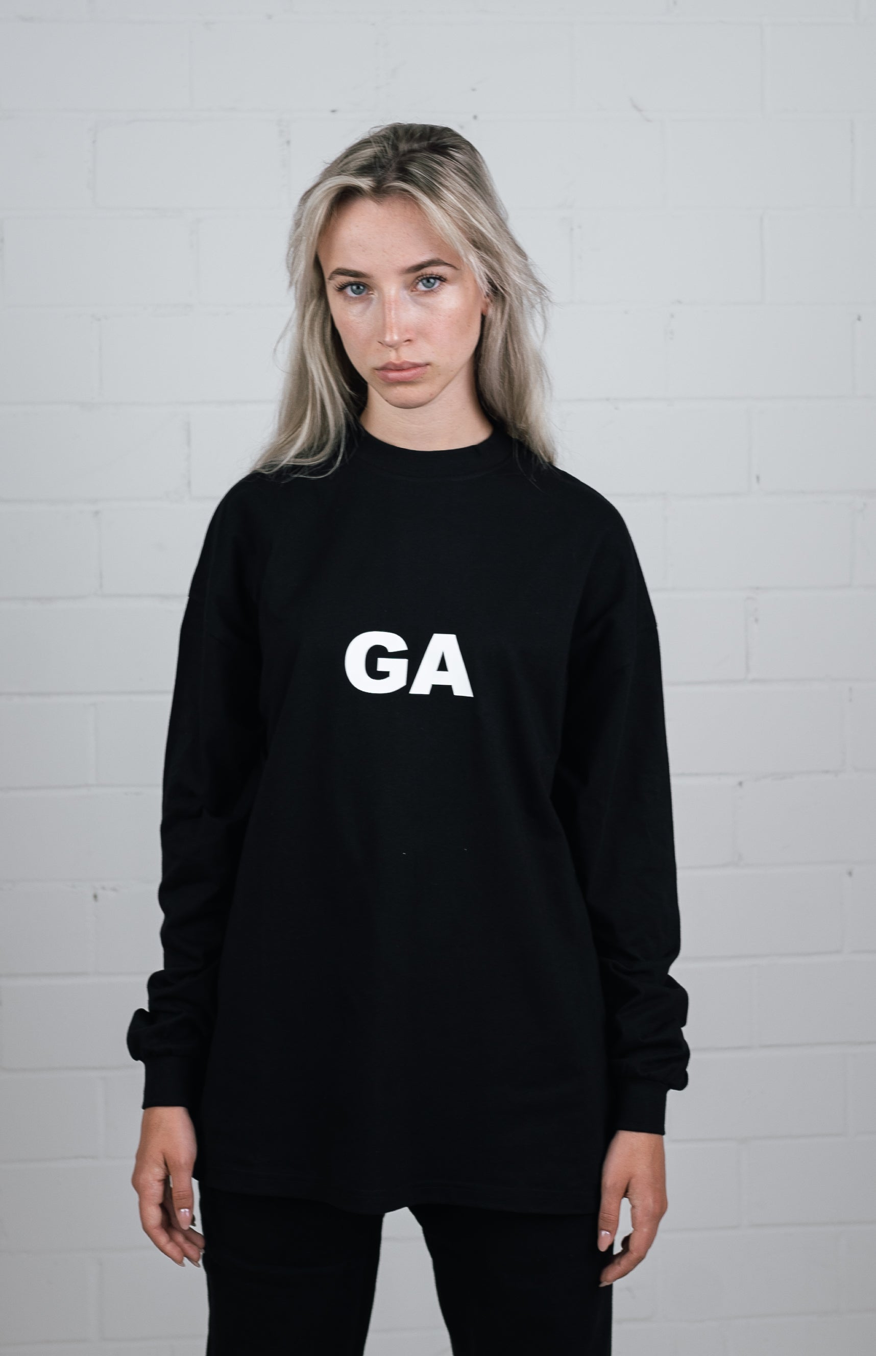 Front View Black Long sleeve worn by female model
