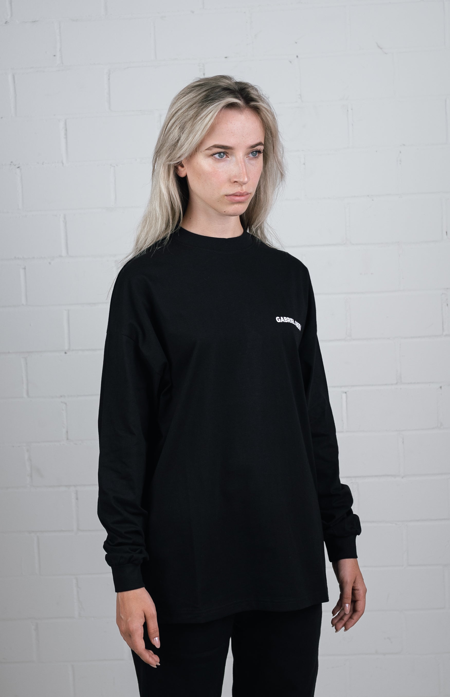 Side View Black Long sleeve worn by female model
