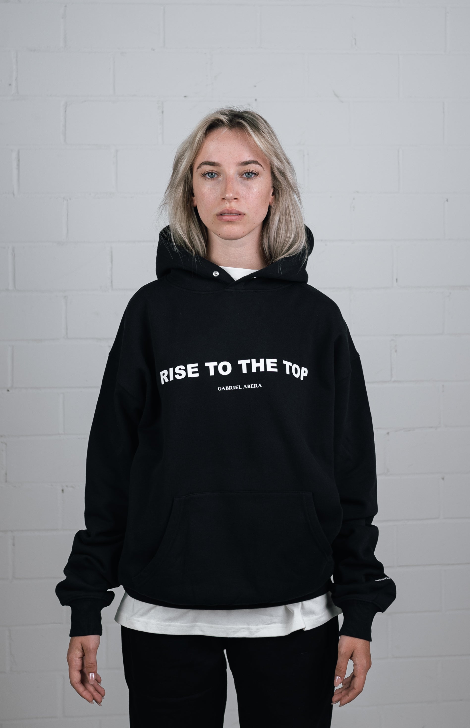Front  View Black Hoodie worn by female model